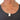 amulet necklace features a single inset ruby on a hand forged and beaten sterling silver dog tag, measuring .75"x 1.25”. it hangs from a sterling ball chain disrupted by a 1" bar