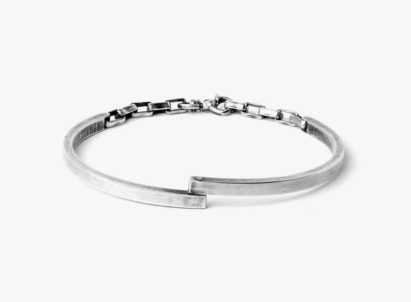 MIXED CHAIN BRACELET 151: two hinged half cuffs are connected to cable links and fastened by a carabiner lobster clasp