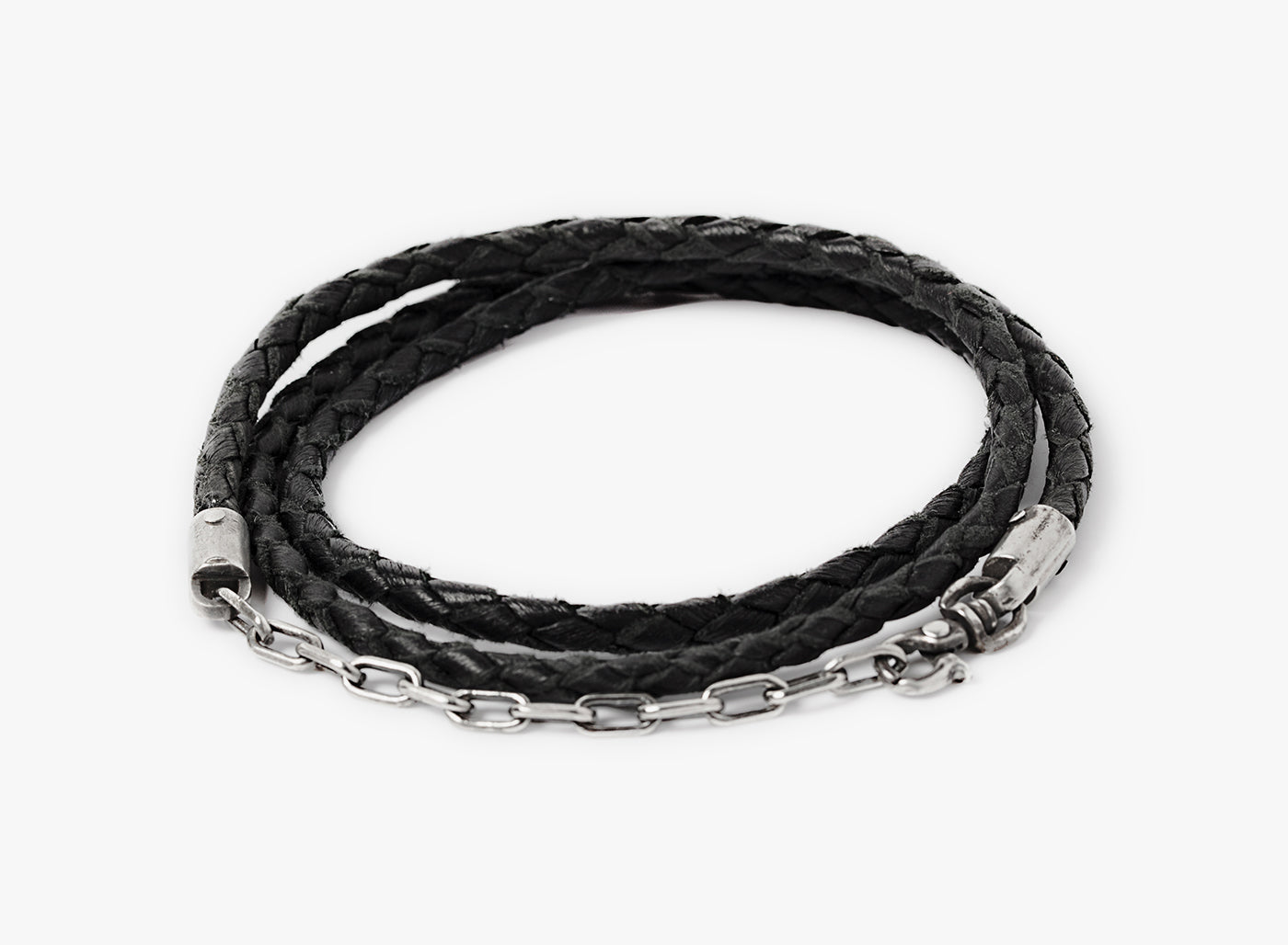 LEATHER BRACELET 171: this adjustable triple wrap bracelet features a hand-braided napa lamb cord, finished with a sterling anchor chain.