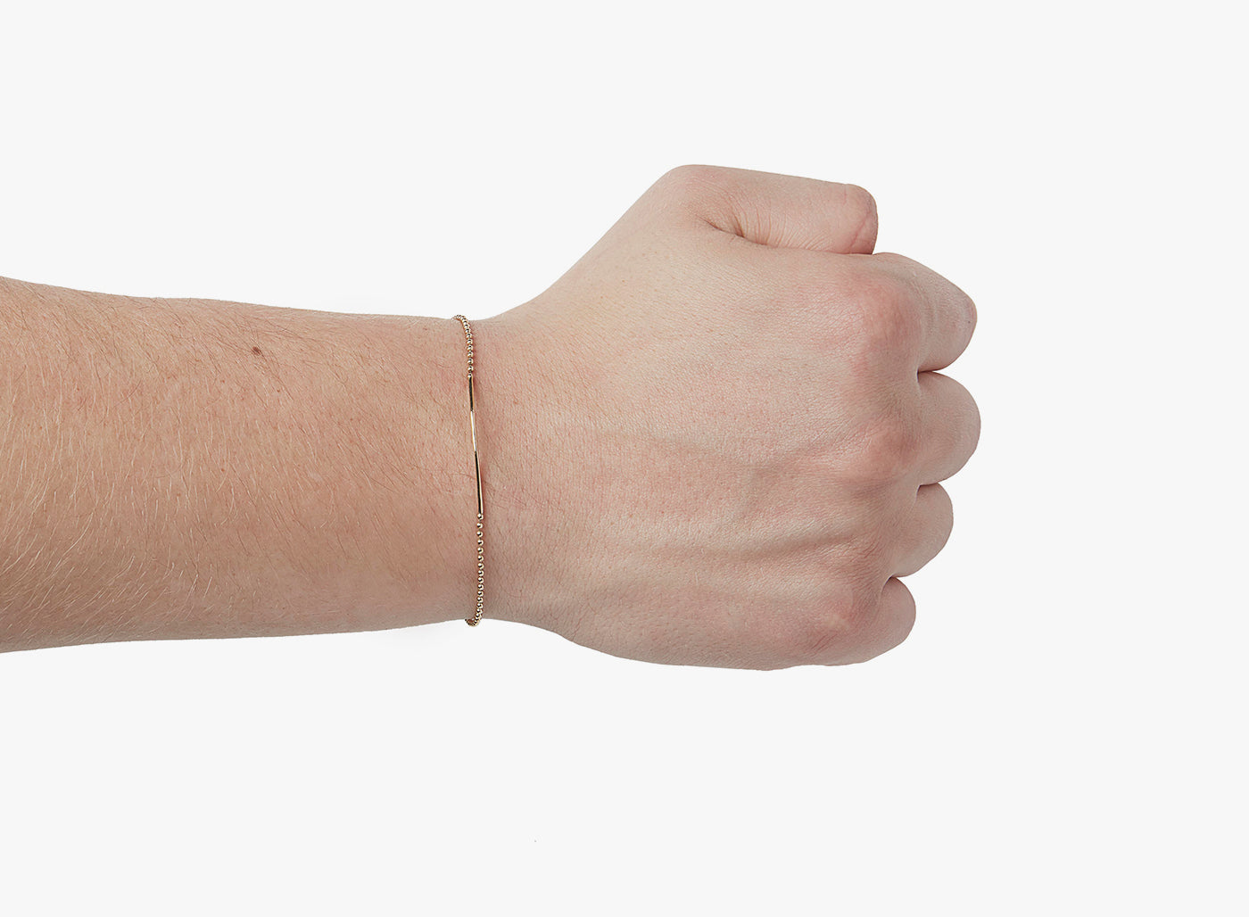 18K SOLID YELLOW GOLD BRACELET 262: this refined asymmetrical bar is offset on an 18K gold ball chain