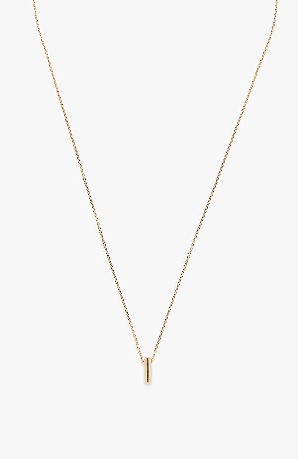 an 18k gold bar hangs from a flat cable chain and is finished with a signature thumbprint amulet. it is constructed in our lower east side studio using reclaimed 18k gold. Each piece is constructed in our lower east side studio using reclaimed 18k gold.