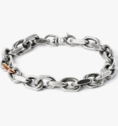 heavy cable chain features a single 18k rose gold link, fastened by a carabiner lobster clasp