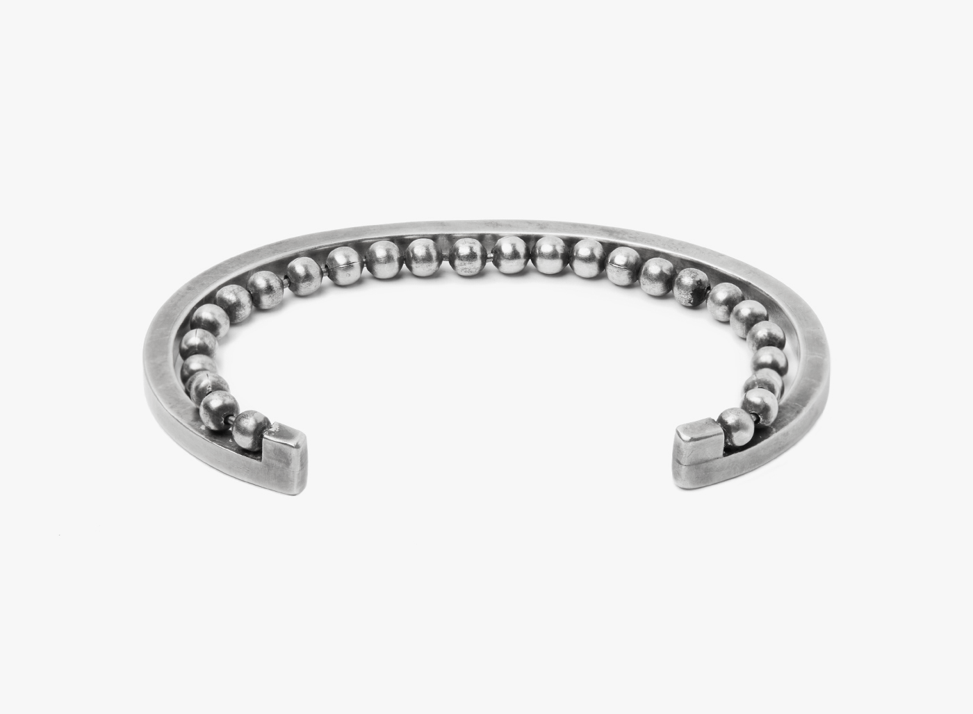 double cuff/ bracelet features a sterling ball chain that connects to a 5mm cuff, giving the effect of wearing 2 pieces in one