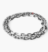 adjustable double wrap bracelet features a strand of sterling beads that connect to a solid cable chain and is finished with our signature ruby