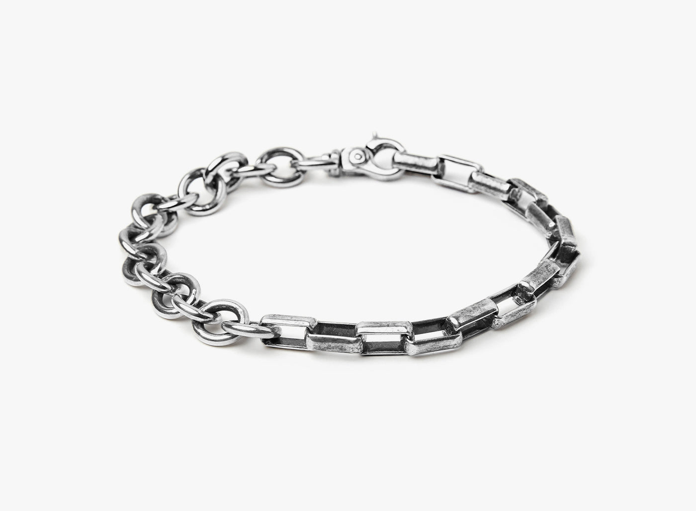 adjustable dual-link bracelet features a large round cable chain that is paired with a box chain