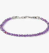 adjustable bracelet features amethyst beaded stones complemented by a sterling anchor chain and finished with our signature single ruby