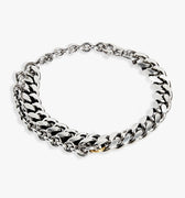 9.5 mm double cuban link is created with an attached chain cable, 18k gold ring attachment and an adjustable lobster clasp