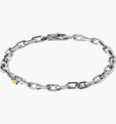 sterling silver anchor chain bracelet features an 18k gold tube detail that wraps around a link