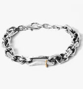 sterling silver bracelet combines a large link diamond cut cable chain with a distressed sterling silver rectangle, accented by an 18k gold hoop