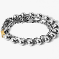 adjustable triple wrap bracelet features three types of sterling silver chain with an 18k gold accent piece