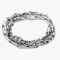 adjustable multi-chain necklace features elongated paperclip, cable, and diamond cut link chains. it also can be worn as a multi-wrap bracelet.