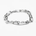 this sterling silver multi-link bracelet features small and large anchor chain details. this piece also converts into a necklace.