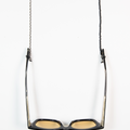 this eyewear chain is designed with onyx beads strung along a sterling silver chain