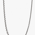 adjustable necklace features 2 varying cable chains and is finished with our signature thumbprint detail