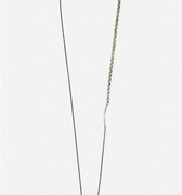 a black raw diamond is secured on this sterling pendant hanging from a beaded ball chain that is disrupted by a 1" bar