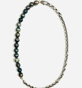 choker features a strand of 8.5mm grade a black tahitian pearls that connect to a round cable chain