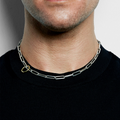 sterling paperclip chain necklace features an offset 18k gold ring