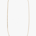 18k gold multi-chain necklace features a one and a half inch hand forged bar that connects to a cable and bead chain