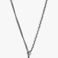 sterling necklace features a contrasting diamond cut cable link that connects to a curb chain. it is finished with a toggle and bar closure and our sterling thumbprint detail.