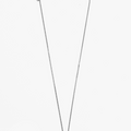 delicate curb chain necklace features a slim sculpted bar accent and an etched silver charm