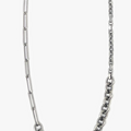 adjustable multi-chain necklace features elongated paperclip, cable, and diamond cut link chains