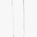 necklace is composed of a hand forged 1" solid 18k yellow gold bar that suspends from a sterling lariat and ball chain