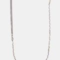 sterling silver multi wrap necklace features varied cable chains, a hand forged silver bar and emerald-cut amethyst gemstone