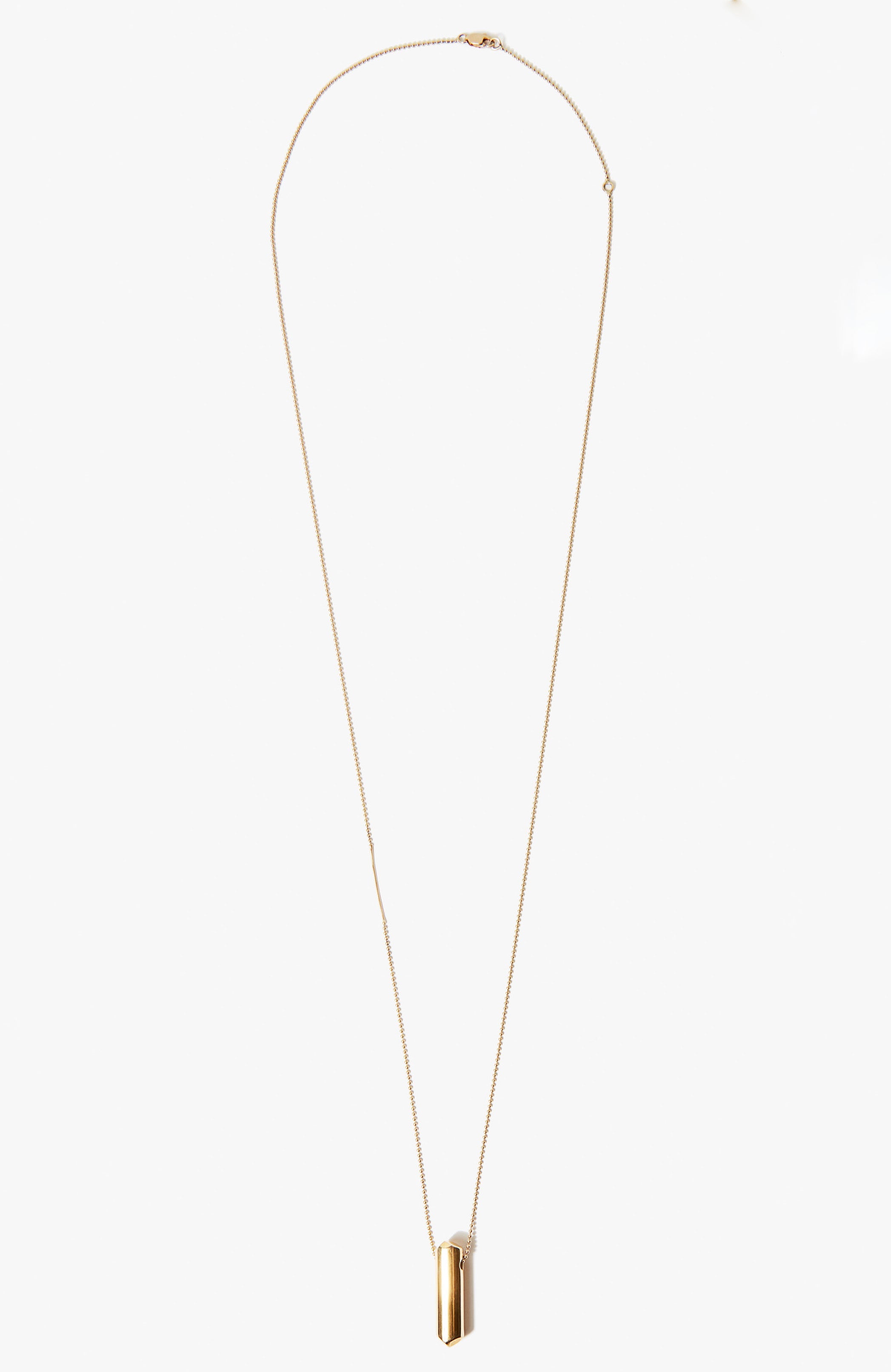 one inch solid 18k gold rod suspends from an ball chain disrupted by a solid bar. it is finished with our signature thumbprint detail