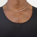 choker-length necklace features a prominent distressed 4" sterling silver bar between single strand anchor chains