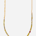 delicate beaded yellow diamond necklace is accented with a single red ruby and finished with varied solid 18k yellow gold chains