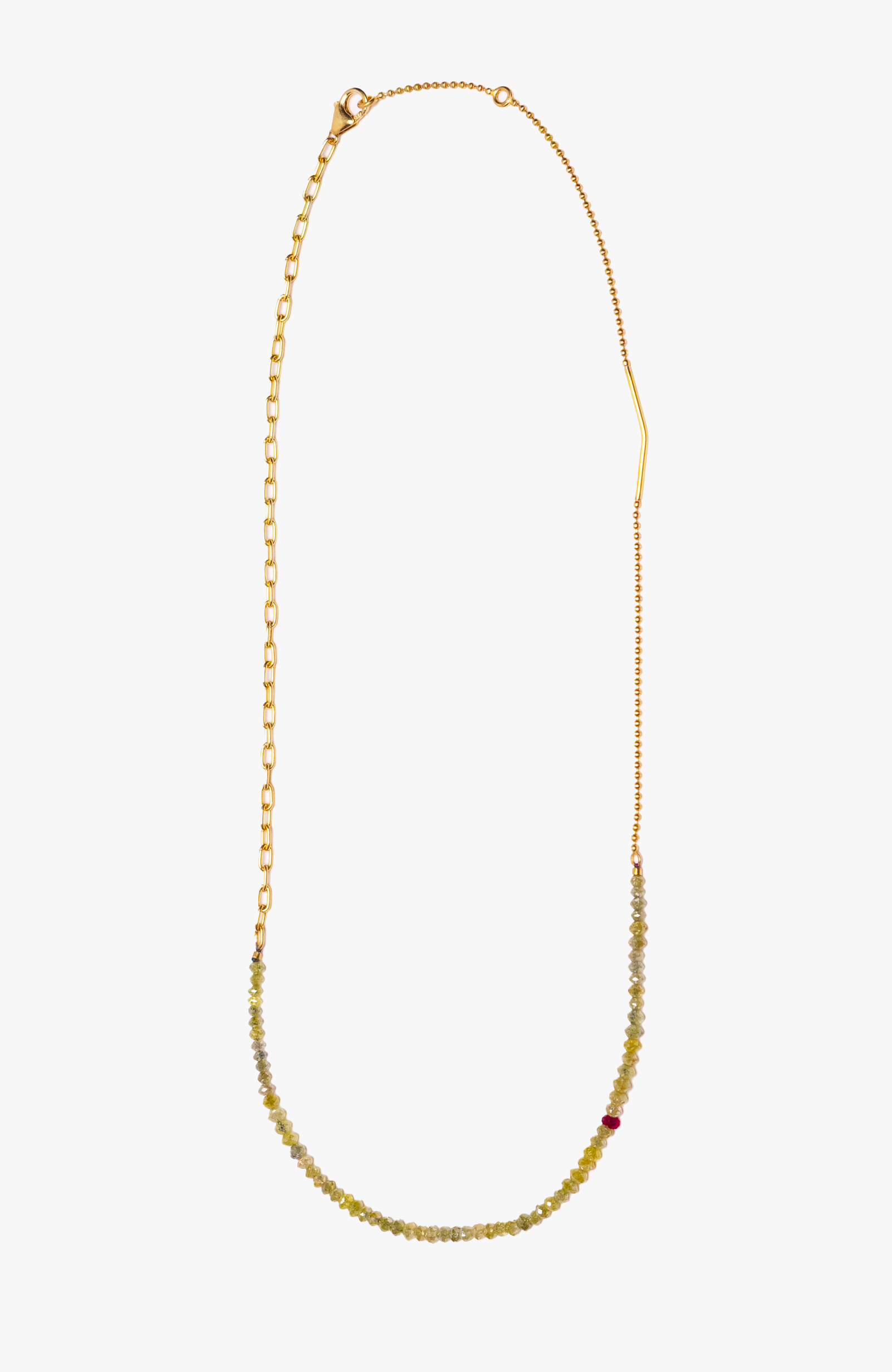 delicate beaded yellow diamond necklace is accented with a single red ruby and finished with varied solid 18k yellow gold chains