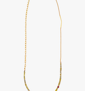 delicate beaded yellow diamond necklace is accented with a single red ruby and finished with varied solid 18k yellow gold chains
