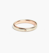 orbital ring is composed of two hinged 18k white gold and rose gold rings