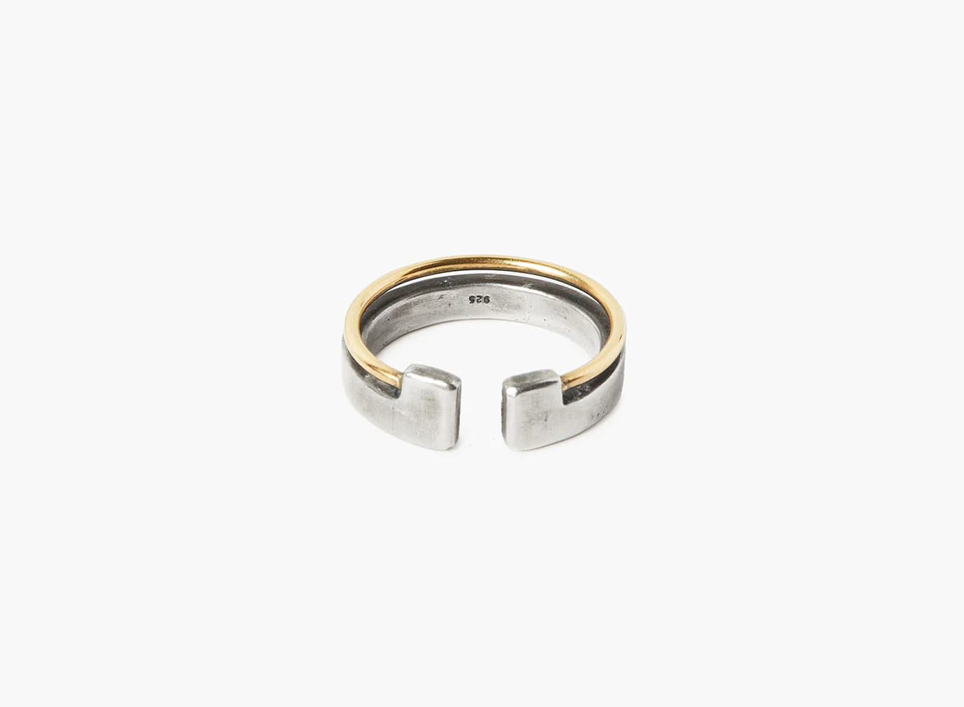 adjustable open ring features a solid 18k gold wire that sits along the sterling band