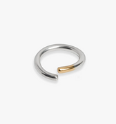 adjustable 10 gauge ring features a curved sterling silver bar, finished with an 18k yellow gold tip