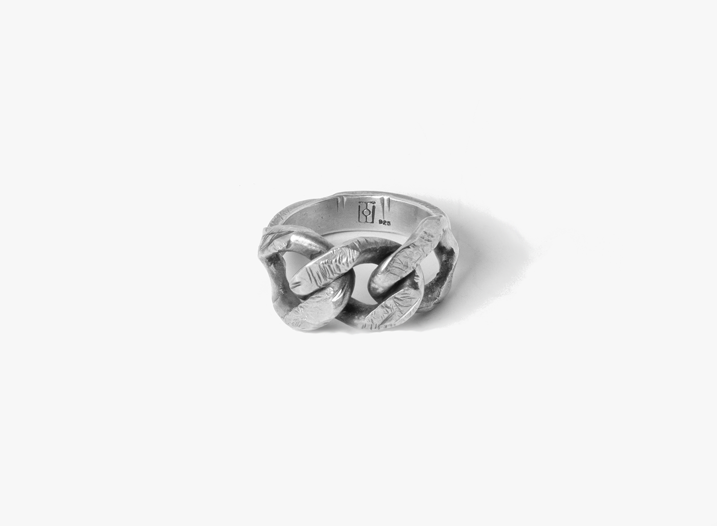 sterling ring is hand distressed and features a large chain link