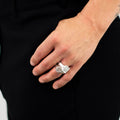 stacked open ring is made from reclaimed silver and features large circular and square signets that hug one another