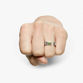 sterling silver open signet ring is hand forged and finished with an emerald-cut peridot stone