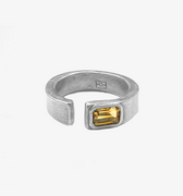 sterling silver open signet ring is hand forged and finished with an emerald-cut citrine stone