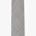 a contrasting hand embroidered stripe crosses this duo tone necktie