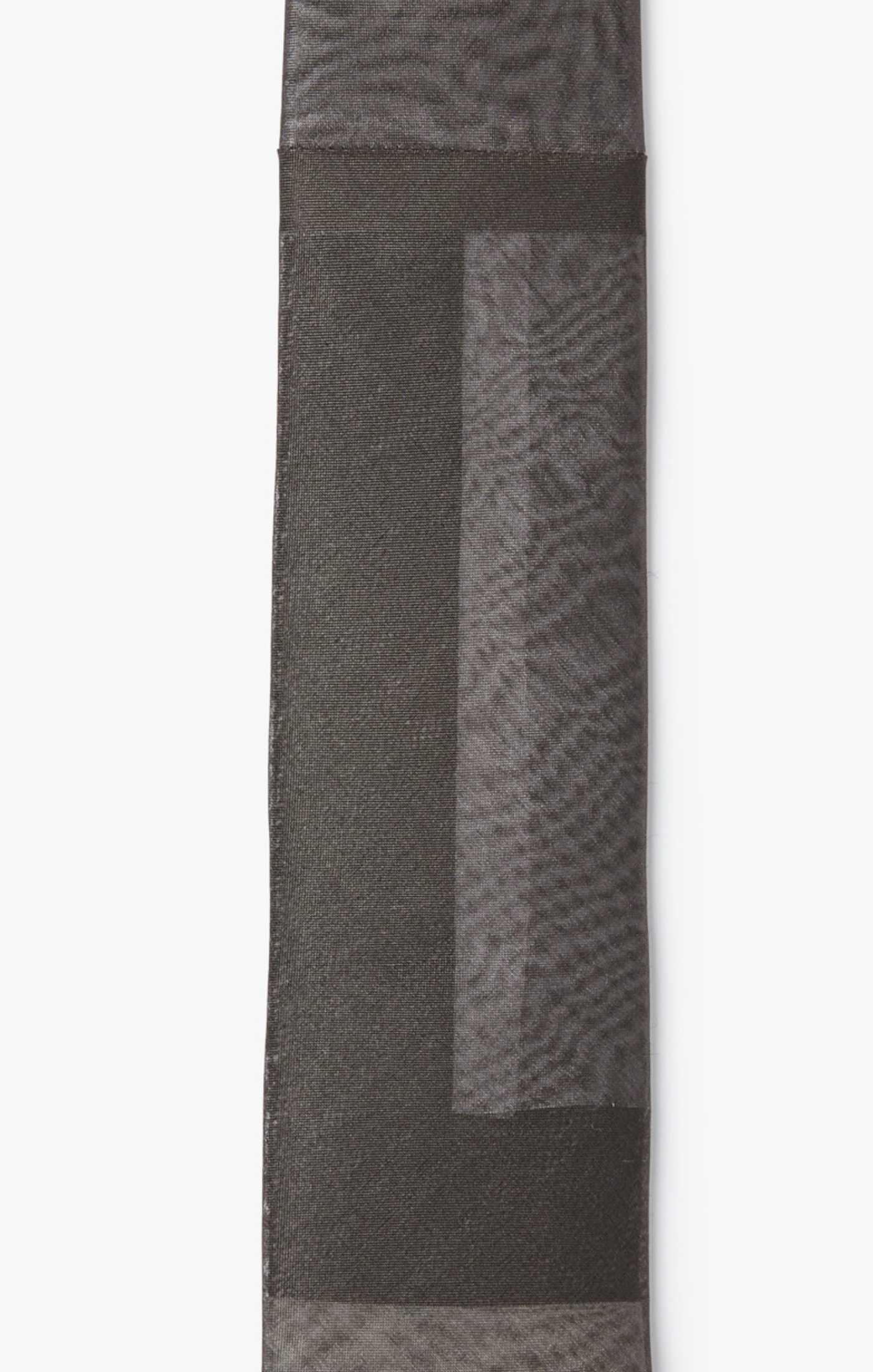 architectural necktie explores dimension and color by layering imported silk organza