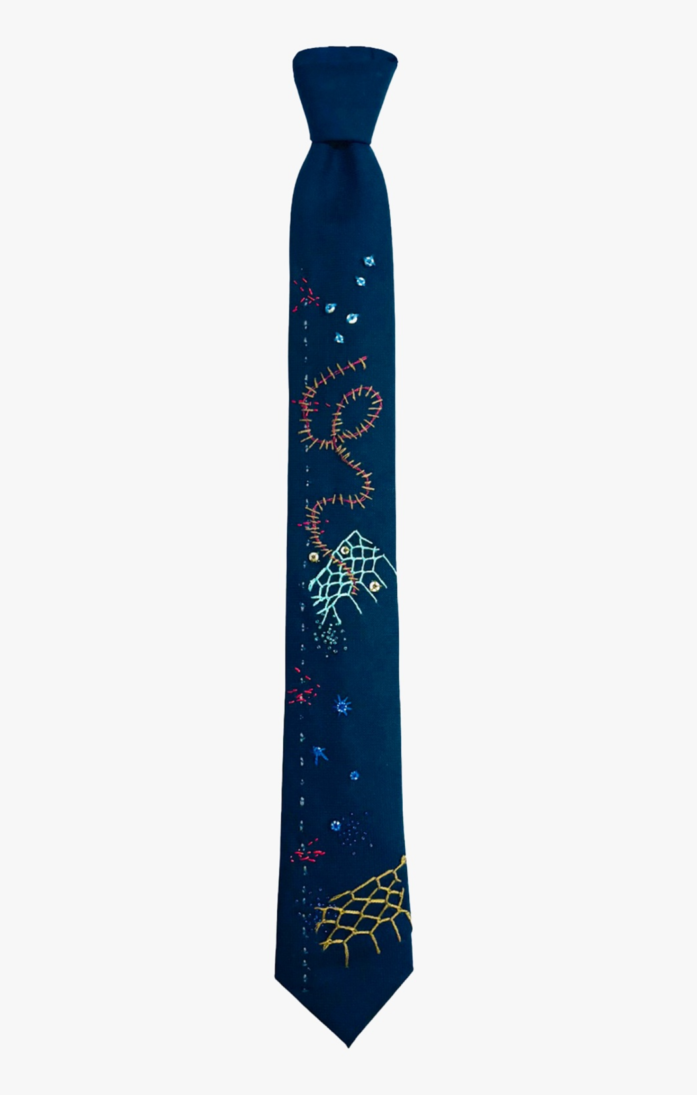 one-of-a-kind tie is hand embellished and embroidered by our in-house team, following only the directive of creative expression. no two are alike and no reissues will be created