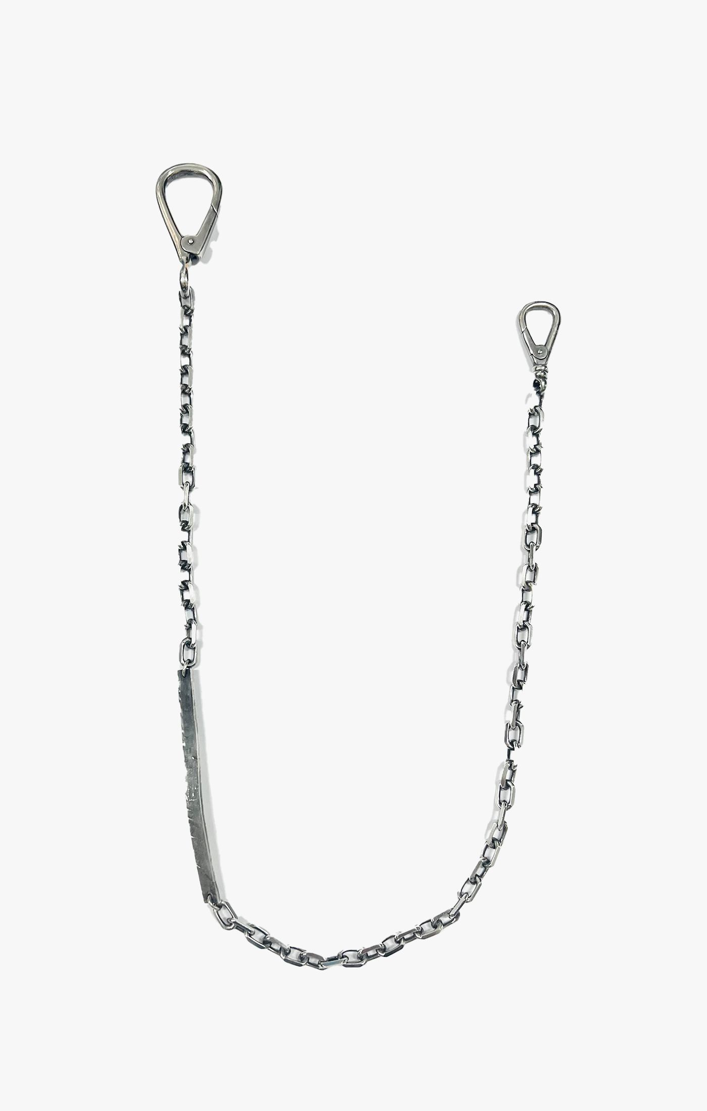 this wallet chain is composed of an elongated anchor chain that attaches to a hand forged sterling bar, and finished with double clasps