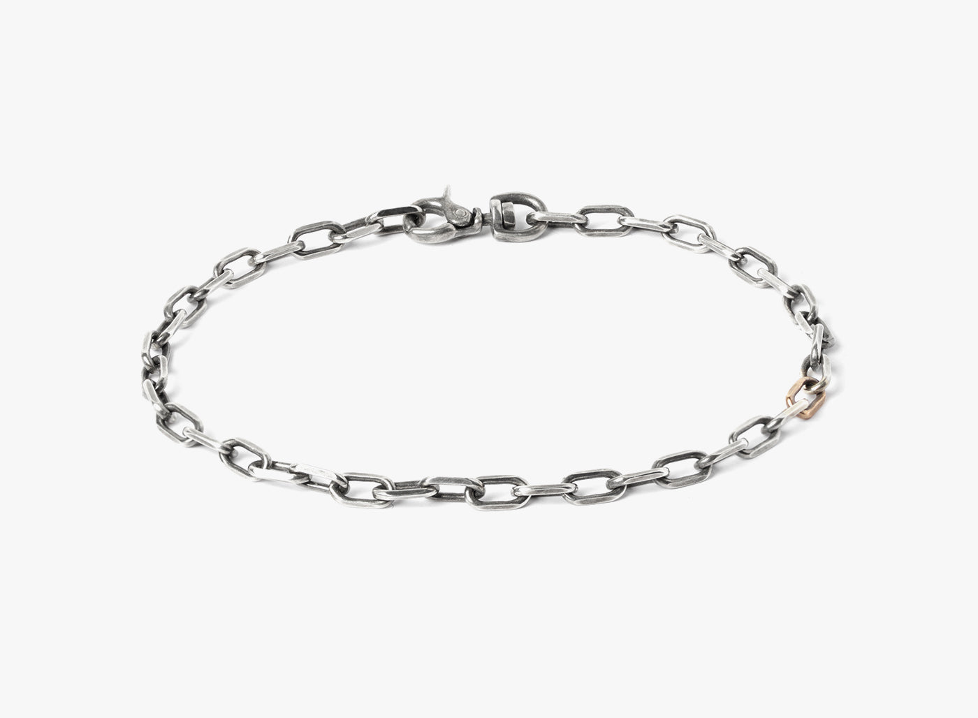 MIXED METAL BRACELET 034: a single 18k rose gold link complements a sterling anchor cable, fastened by a carabiner lobster clasp