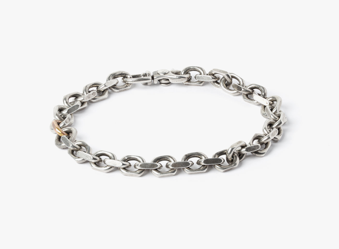 MIXED METAL BRACELET 035: this adjustable sterling cable chain is offset by a single 18k rose gold link
