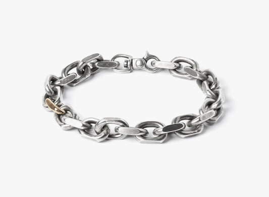 MIXED METAL BRACELET 036: this heavy cable chain features a single 18k rose gold link, fastened by a carabiner lobster clasp