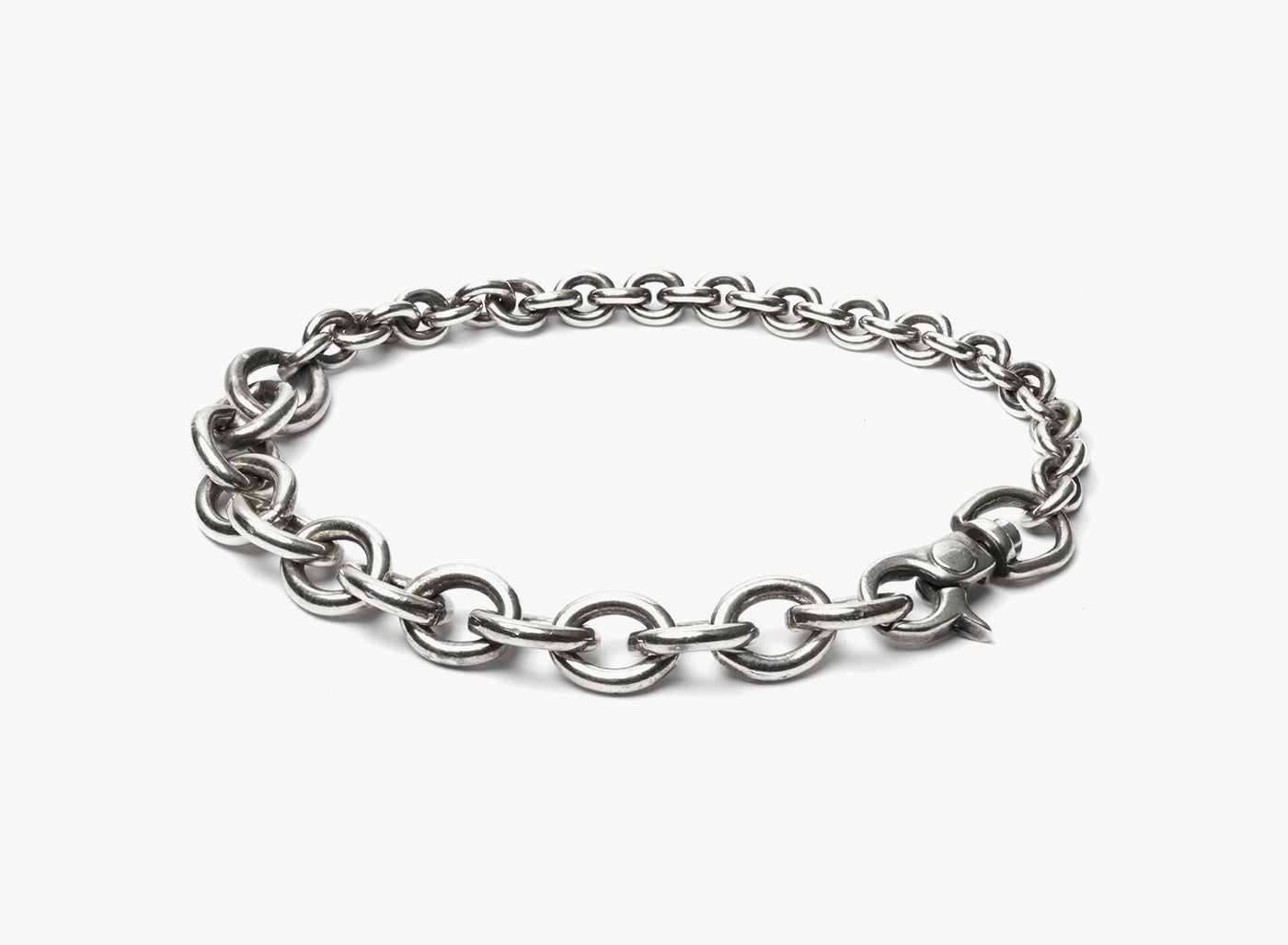 MIXED CHAIN BRACELET 114: this adjustable bracelet consists of varied sterling cable chains.