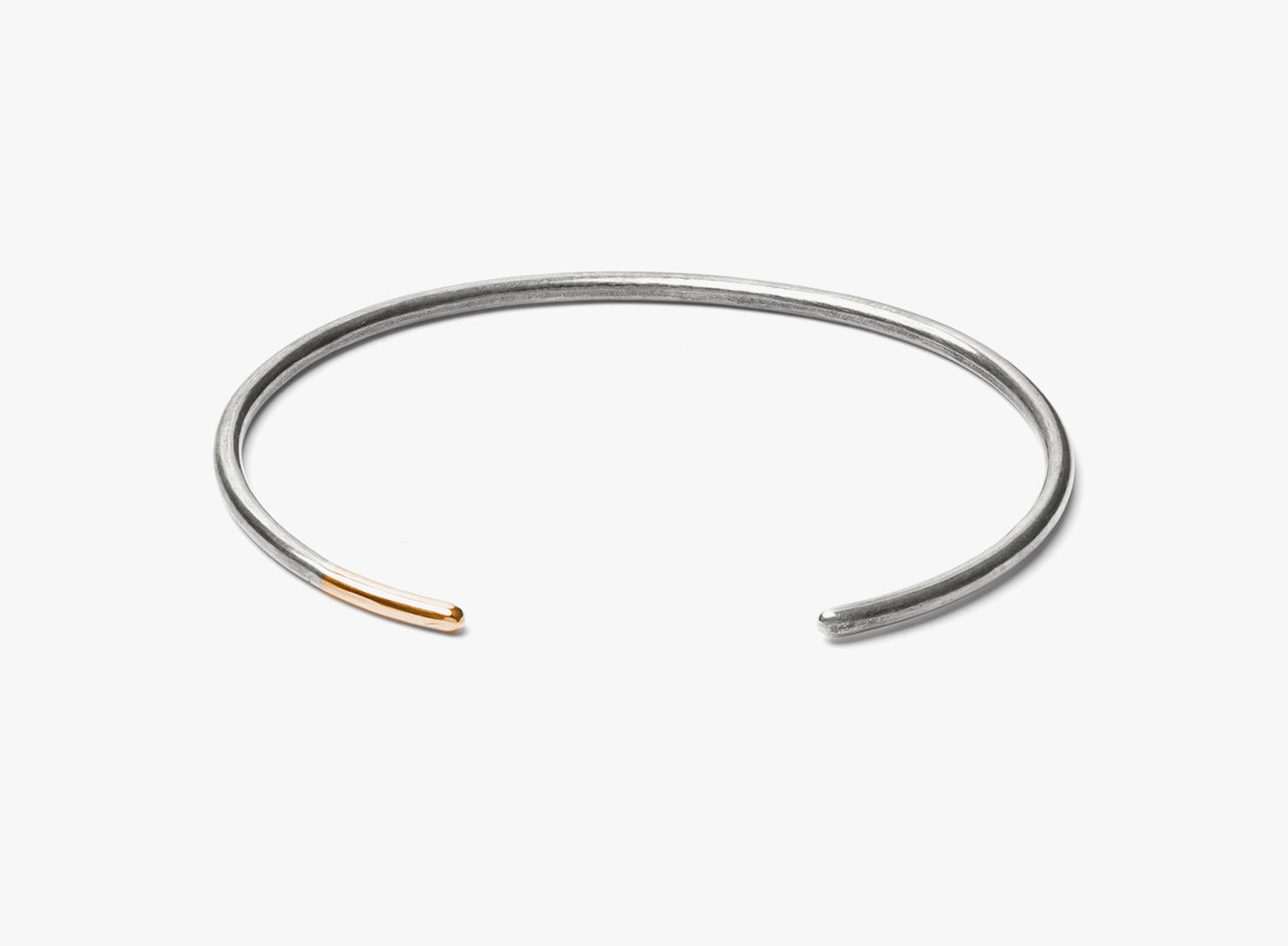 MIXED METAL STERLING SILVER / 18K ROSE GOLD CUFF BRACELET 118: this 10 gauge silver cuff is finished with an 18k rose gold tip