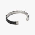 LEATHER CUFF 126: the balance of firm and malleable is illustrated in this 10mm hand-braided leather band that is riveted onto a sterling cuff