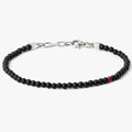 BEADED STONES ONYX BRACELET 152: this adjustable onyx stone bracelet is finished with a signature single ruby
